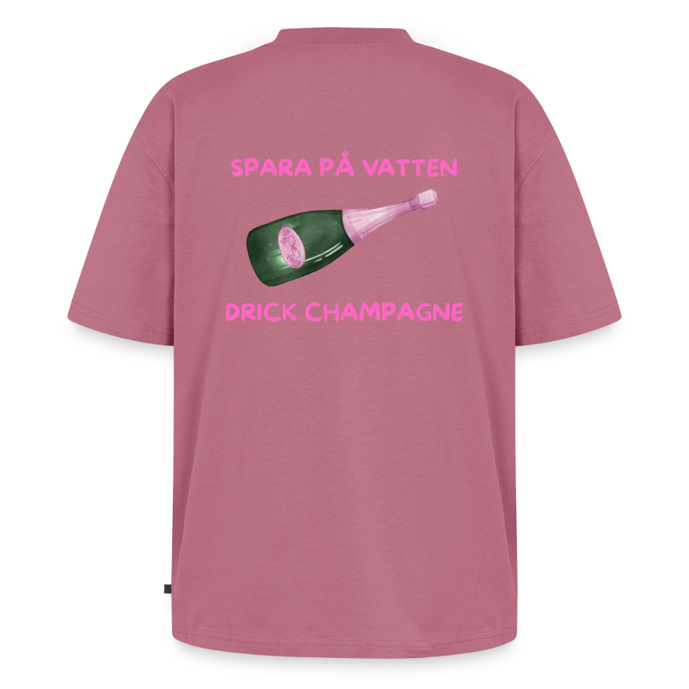 Spara på vatten, drick champagne Oversized premium-T-shirt Unisex - malvafärgad